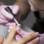 nail-art-professional-working-client-nails